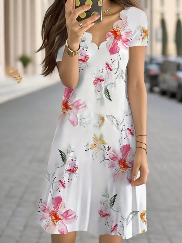 Mirelle - Elegant knee-length dress with floral print and V-neckline