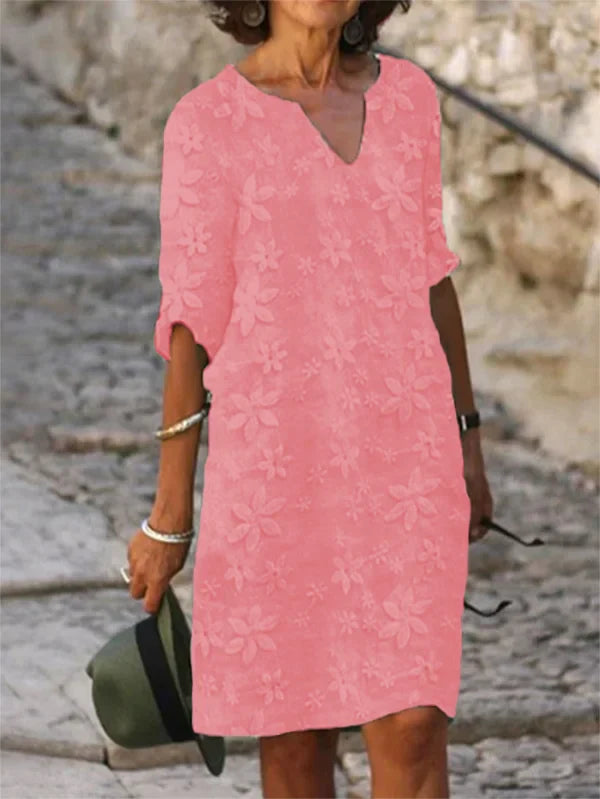Kia| Plain short-sleeved dress with V-neck and flower pattern