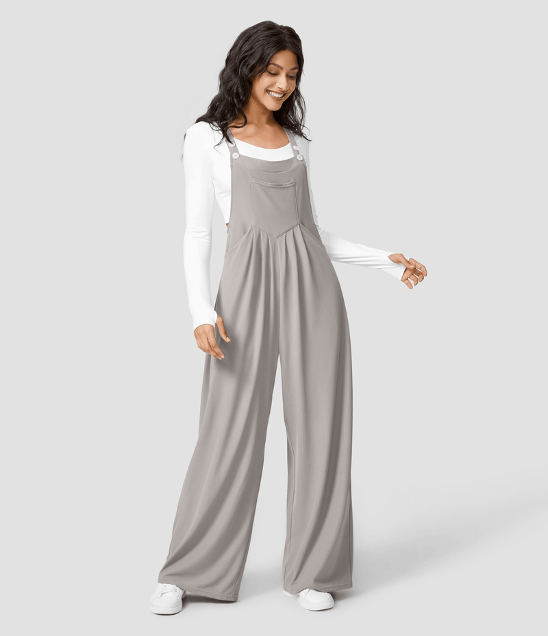 Pants with adjustable buttons on the straps